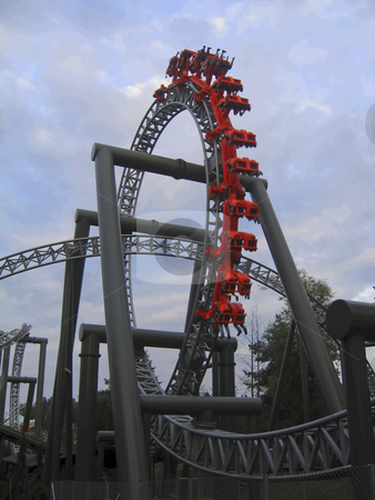 To use this stock image in your creative project, please select the size you need over to the right and click the "Add to Cart" button.
Your downloaded image will come with the Cutcaster watermark removed so don’t worry about the watermark you see on this page. Roller coaster loop stock photo, People riding the roller coaster of the amusement park of Tampere, Finland by Alessandro Rizzolli