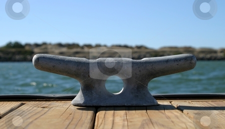 To use this stock image in your creative project, please select the size you need over to the right and click the "Add to Cart" button.
Your downloaded image will come with the Cutcaster watermark removed so don’t worry about the watermark you see on this page. Dock Cleats stock photo, Dock cleats on a pier to tie-up boats. by Henrik Lehnerer
