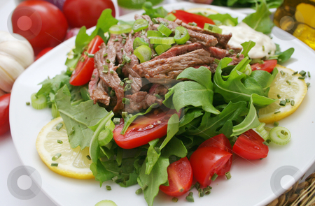 To use this stock image in your creative project, please select the size you need over to the right and click the "Add to Cart" button.
Your downloaded image will come with the Cutcaster watermark removed so don’t worry about the watermark you see on this page. Fresh salad with beef stock photo, Fresh salad with beef by Yvonne Bogdanski