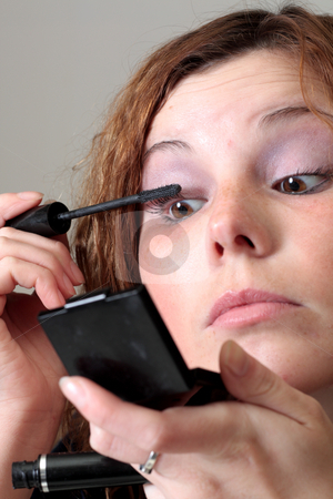 To use this stock image in your creative project, please select the size you need over to the right and click the "Add to Cart" button.
Your downloaded image will come with the Cutcaster watermark removed so don’t worry about the watermark you see on this page. Make-up stock photo, by Mikhail Egorov