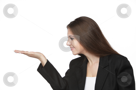 To use this stock image in your creative project, please select the size you need over to the right and click the "Add to Cart" button.
Your downloaded image will come with the Cutcaster watermark removed so don’t worry about the watermark you see on this page. Business woman looking at her empty hand stock photo, Business woman looking at her empty hand over white by Ivelin Radkov