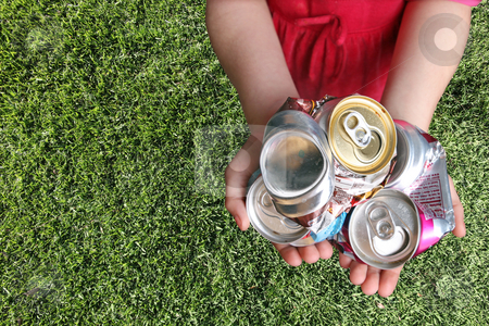 To use this stock image in your creative project, please select the size you need over to the right and click the "Add to Cart" button.
Your downloaded image will come with the Cutcaster watermark removed so don’t worry about the watermark you see on this page. Aluminum Cans Crushed For Recycling stock photo, Aluminum Cans Crushed For Recycling in a Childs Hands by Katrina Brown