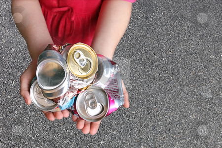 To use this stock image in your creative project, please select the size you need over to the right and click the "Add to Cart" button.
Your downloaded image will come with the Cutcaster watermark removed so don’t worry about the watermark you see on this page. Child Recycling Aluminum Cans stock photo, Recycling Aluminum Cans in a Child's Hands by Katrina Brown