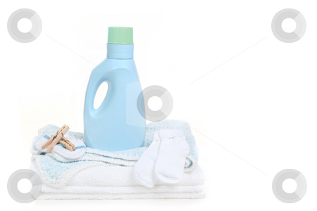 To use this stock image in your creative project, please select the size you need over to the right and click the "Add to Cart" button.
Your downloaded image will come with the Cutcaster watermark removed so don’t worry about the watermark you see on this page. Baby Blanket With Socks Clothespins and Detergent stock photo, Baby Blanket With Socks Clothespins and Detergent on White Background by Katrina Brown