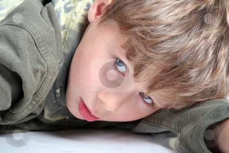 To use this stock image in your creative project, please select the size you need over to the right and click the "Add to Cart" button.
Your downloaded image will come with the Cutcaster watermark removed so don’t worry about the watermark you see on this page. Young boy stock photo, Young boy by Yvonne Bogdanski