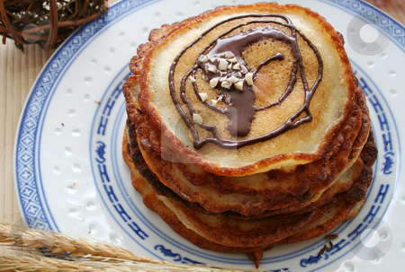 To use this stock image in your creative project, please select the size you need over to the right and click the "Add to Cart" button.
Your downloaded image will come with the Cutcaster watermark removed so don’t worry about the watermark you see on this page. Pan cakes stock photo, Pan cakes by Yvonne Bogdanski