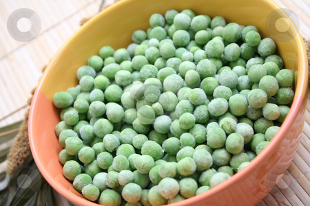 To use this stock image in your creative project, please select the size you need over to the right and click the "Add to Cart" button.
Your downloaded image will come with the Cutcaster watermark removed so don’t worry about the watermark you see on this page. Frozen peas stock photo, Frozen peas by Yvonne Bogdanski