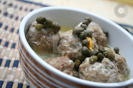 To use this stock image in your creative project, please select the size you need over to the right and click the "Add to Cart" button.
Your downloaded image will come with the Cutcaster watermark removed so don’t worry about the watermark you see on this page. Meatballs stock photo, by Yvonne Bogdanski