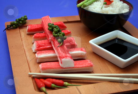 To use this stock image in your creative project, please select the size you need over to the right and click the "Add to Cart" button.
Your downloaded image will come with the Cutcaster watermark removed so don’t worry about the watermark you see on this page. Surimi stock photo, by Yvonne Bogdanski