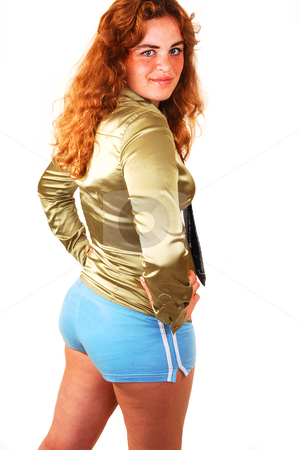 To use this stock image in your creative project, please select the size you need over to the right and click the "Add to Cart" button.
Your downloaded image will come with the Cutcaster watermark removed so don’t worry about the watermark you see on this page. Nice back view. stock photo, Pretty smiling girl with bright red hair, an gold colored blouse and blue
tight shorts, shooing her bottom. by Horst Petzold