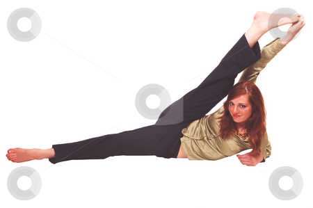 To use this stock image in your creative project, please select the size you need over to the right and click the "Add to Cart" button.
Your downloaded image will come with the Cutcaster watermark removed so don’t worry about the watermark you see on this page. Acrobatic girl. stock photo, A very flexible young teenager sitting on the floor and stretching one
leg over her head. by Horst Petzold