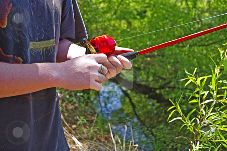 To use this stock image in your creative project, please select the size you need over to the right and click the "Add to Cart" button.
Your downloaded image will come with the Cutcaster watermark removed so don’t worry about the watermark you see on this page. Gone Fishin' stock photo, Close up of young man with fishing pole by Sandra Fann