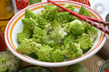 To use this stock image in your creative project, please select the size you need over to the right and click the "Add to Cart" button.
Your downloaded image will come with the Cutcaster watermark removed so don’t worry about the watermark you see on this page. Romanesco stock photo, by Yvonne Bogdanski