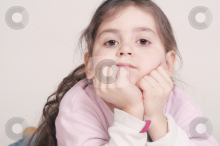 To use this stock image in your creative project, please select the size you need over to the right and click the "Add to Cart" button.
Your downloaded image will come with the Cutcaster watermark removed so don’t worry about the watermark you see on this page. Little girl stock photo, by Yvonne Bogdanski