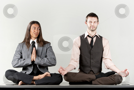 To use this stock image in your creative project, please select the size you need over to the right and click the "Add to Cart" button.
Your downloaded image will come with the Cutcaster watermark removed so don’t worry about the watermark you see on this page. Two businessmen meditating stock photo, Two businessmen meditating on their office desk by Scott Griessel