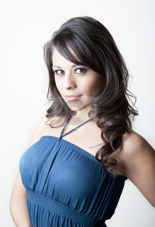 To use this stock image in your creative project, please select the size you need over to the right and click the "Add to Cart" button.
Your downloaded image will come with the Cutcaster watermark removed so don’t worry about the watermark you see on this page. Pretty Hispanic Woman stock photo, Pretty Hispanic woman in a blue dress by Scott Griessel