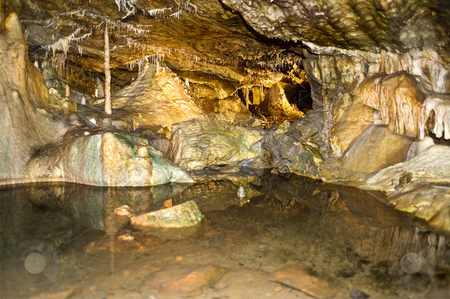 To use this stock image in your creative project, please select the size you need over to the right and click the "Add to Cart" button.
Your downloaded image will come with the Cutcaster watermark removed so don’t worry about the watermark you see on this page. Grottes d' Hotton stock photo, The interior cavern with an underground lake of the Hotton grottoes in Belgium by Corepics VOF