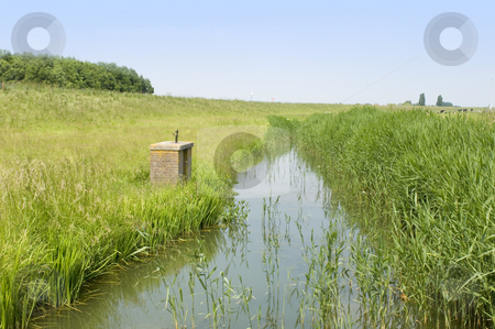 To use this stock image in your creative project, please select the size you need over to the right and click the "Add to Cart" button.
Your downloaded image will come with the Cutcaster watermark removed so don’t worry about the watermark you see on this page. Dutch Polder stock photo, A typical Dutch Polder with a small, muddy, ditch and grazing cows on a nice summer afternoon by Corepics VOF