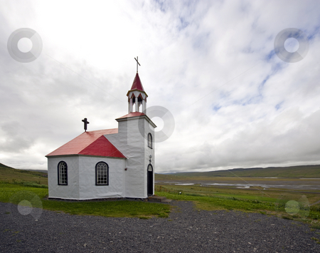 To use this stock image in your creative project, please select the size you need over to the right and click the "Add to Cart" button.
Your downloaded image will come with the Cutcaster watermark removed so don’t worry about the watermark you see on this page. Arctic Church stock photo, A typical octagonal church, build from drift wood in Iceland by Corepics VOF