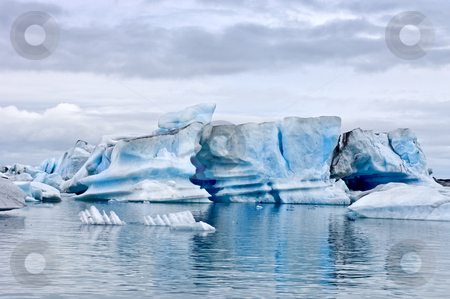 To use this stock image in your creative project, please select the size you need over to the right and click the "Add to Cart" button.
Your downloaded image will come with the Cutcaster watermark removed so don’t worry about the watermark you see on this page. Jokulsarlon Glacier Lake stock photo, The famous Jokulsarlon glacier lake in Iceland, where the icebergs, originating from the Vatnajokull float. This location was used for various action movies. by Corepics VOF