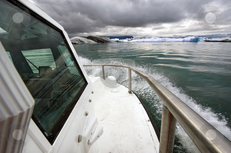 To use this stock image in your creative project, please select the size you need over to the right and click the "Add to Cart" button.
Your downloaded image will come with the Cutcaster watermark removed so don’t worry about the watermark you see on this page. Amphibian craft stock photo, An amphibian craft entering the Jokulsarlon Glacier lake in Iceland by Corepics VOF