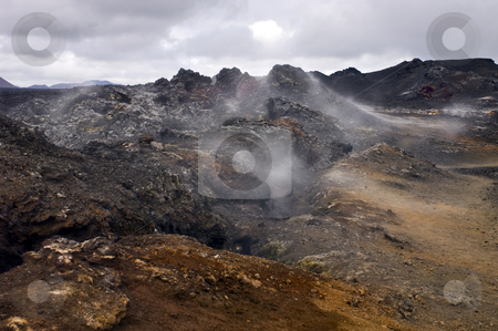 To use this stock image in your creative project, please select the size you need over to the right and click the "Add to Cart" button.
Your downloaded image will come with the Cutcaster watermark removed so don’t worry about the watermark you see on this page. Active Volcanic Fissure stock photo, An active volcanic fissure in the Krafla system, surrounded by steaming hot Lava from the 1984 Eruption by Corepics VOF