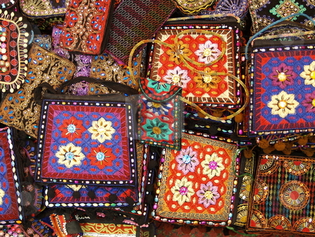 To use this stock image in your creative project, please select the size you need over to the right and click the "Add to Cart" button.
Your downloaded image will come with the Cutcaster watermark removed so don’t worry about the watermark you see on this page. Handcraft 11 stock photo, Group of hindi style pouches by Jose .