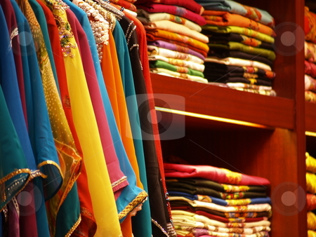 To use this stock image in your creative project, please select the size you need over to the right and click the "Add to Cart" button.
Your downloaded image will come with the Cutcaster watermark removed so don’t worry about the watermark you see on this page. Textiles 01 stock photo, Colorful shirts on display by Jose .