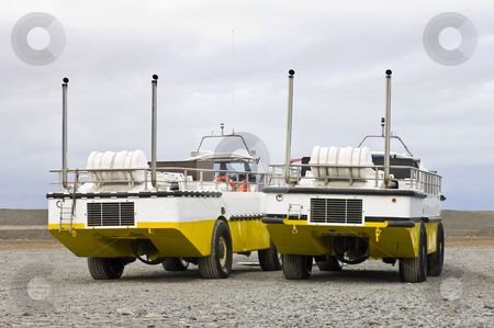 To use this stock image in your creative project, please select the size you need over to the right and click the "Add to Cart" button.
Your downloaded image will come with the Cutcaster watermark removed so don’t worry about the watermark you see on this page. Two Amphibian crafts stock photo, Two amphibious vehicles, used to carry passengers and/or tourists over the Jokulsarlon Glacier lake in Iceland by Corepics VOF
