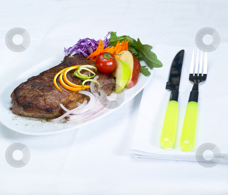 To use this stock image in your creative project, please select the size you need over to the right and click the "Add to Cart" button.
Your downloaded image will come with the Cutcaster watermark removed so don’t worry about the watermark you see on this page. Beef ribeye steak stock photo, Fresh juicy beef ribeye steak grilled with lemon and orange peel on top and vegetables beside by Francesco Perre