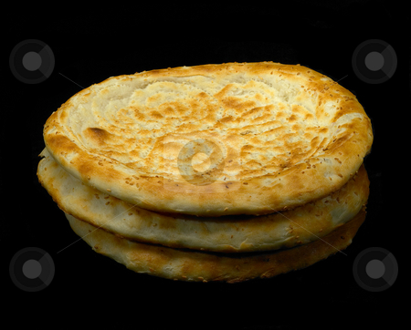 To use this stock image in your creative project, please select the size you need over to the right and click the "Add to Cart" button.
Your downloaded image will come with the Cutcaster watermark removed so don’t worry about the watermark you see on this page. Uzbek bread stock photo, Original fresh uzbek bread isolated over black background by Francesco Perre