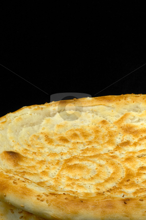 To use this stock image in your creative project, please select the size you need over to the right and click the "Add to Cart" button.
Your downloaded image will come with the Cutcaster watermark removed so don’t worry about the watermark you see on this page. Uzbek bread stock photo, Fresh just made traditional uzbek bread close up by Francesco Perre