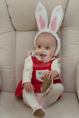 To use this stock image in your creative project, please select the size you need over to the right and click the "Add to Cart" button.
Your downloaded image will come with the Cutcaster watermark removed so don’t worry about the watermark you see on this page. Little Easter Bunny stock photo, Little caucasian baby girl with Easter Bunny ears. by Mariusz Jurgielewicz