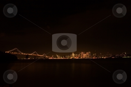 To use this stock image in your creative project, please select the size you need over to the right and click the "Add to Cart" button.
Your downloaded image will come with the Cutcaster watermark removed so don’t worry about the watermark you see on this page. San Francisco skyline at night stock photo, San Francisco is a popular international tourist destination renowned for its summer fog, steep rolling hills, eclectic mix of Victorian and modern architecture and its famous landmarks, including the Golden Gate Bridge, the cable cars, and Chinatown. by Mariusz Jurgielewicz