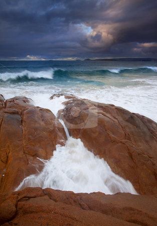 To use this stock image in your creative project, please select the size you need over to the right and click the "Add to Cart" button.
Your downloaded image will come with the Cutcaster watermark removed so don’t worry about the watermark you see on this page. Surfs Up stock photo, Major Waves hitting the rocky shores of the Knights Beach on the Fleurieu PEninsula beneath stomy skies. by Mike Dawson