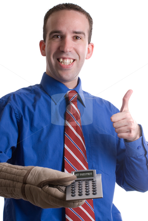To use this stock image in your creative project, please select the size you need over to the right and click the "Add to Cart" button.
Your downloaded image will come with the Cutcaster watermark removed so don’t worry about the watermark you see on this page. Good Investment stock photo, A young banker giving a thumbs up and holding a calculator with an oven mitt to signify a hot investment, isolated against a white background by Richard Nelson