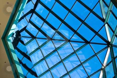 To use this stock image in your creative project, please select the size you need over to the right and click the "Add to Cart" button.
Your downloaded image will come with the Cutcaster watermark removed so don’t worry about the watermark you see on this page. Angular Glass Panes stock photo, Angular glass panes in skylight by Steve Carroll