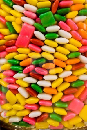 To use this stock image in your creative project, please select the size you need over to the right and click the "Add to Cart" button.
Your downloaded image will come with the Cutcaster watermark removed so don’t worry about the watermark you see on this page. Candy in Jar stock photo, Candy; bits; gum; pieces; jar; bright; colors; brightly; shapes; texture; background; colored; chicklets; by Steve Carroll