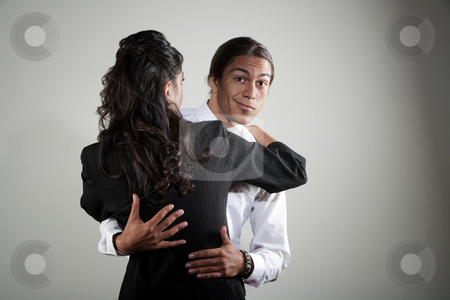 To use this stock image in your creative project, please select the size you need over to the right and click the "Add to Cart" button.
Your downloaded image will come with the Cutcaster watermark removed so don’t worry about the watermark you see on this page. Mixed race professional man embracing Hispanic woman stock photo, Handsome mixed race man embracing pretty Hispanic coworker by Scott Griessel