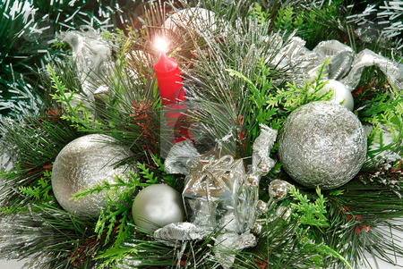 To use this stock image in your creative project, please select the size you need over to the right and click the "Add to Cart" button.
Your downloaded image will come with the Cutcaster watermark removed so don’t worry about the watermark you see on this page. New year decoration stock photo, Christmas decoration with silver balls and red candel by Julija Sapic