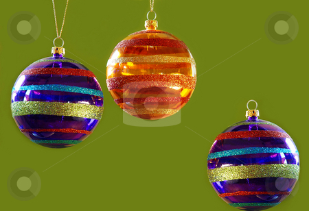 To use this stock image in your creative project, please select the size you need over to the right and click the "Add to Cart" button.
Your downloaded image will come with the Cutcaster watermark removed so don’t worry about the watermark you see on this page. Christmas balls stock photo, Three christmas balls decorations isolated over green by Julija Sapic