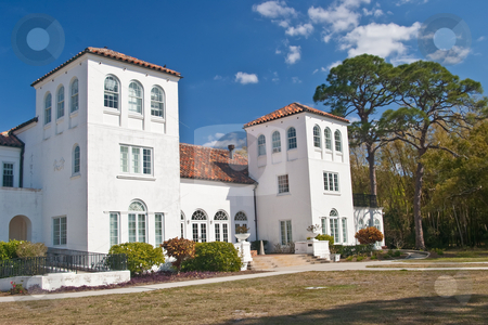 To use this stock image in your creative project, please select the size you need over to the right and click the "Add to Cart" button.
Your downloaded image will come with the Cutcaster watermark removed so don’t worry about the watermark you see on this page. Hester Ringling Landcaster Sanford Mansion stock photo, Winter retreat of Hester Ringling Landcaster Sanford, daughter of Charles and Edith ringling. Now owned by the State of Florida and used as administrative offices of the New College of Florida. by Steve Carroll