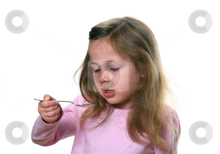 To use this stock image in your creative project, please select the size you need over to the right and click the "Add to Cart" button.
Your downloaded image will come with the Cutcaster watermark removed so don’t worry about the watermark you see on this page. Child Taking Medicine stock photo, Little girl holding a spoon about to take liquid medication by Anita Peppers