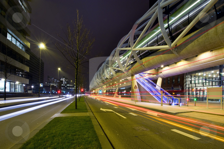 To use this stock image in your creative project, please select the size you need over to the right and click the "Add to Cart" button.
Your downloaded image will come with the Cutcaster watermark removed so don’t worry about the watermark you see on this page. Futuristic tram tube stock photo, The futuristic elevated tram line in the Hague and underlying road by Corepics VOF