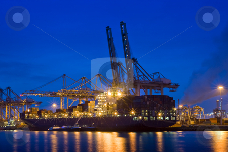 To use this stock image in your creative project, please select the size you need over to the right and click the "Add to Cart" button.
Your downloaded image will come with the Cutcaster watermark removed so don’t worry about the watermark you see on this page. Container terminal at night stock photo, The activity of loading and unloading of huge container ships at the world's biggest and busiest container harbor in Rotterdam by Corepics VOF