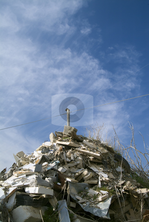 To use this stock image in your creative project, please select the size you need over to the right and click the "Add to Cart" button.
Your downloaded image will come with the Cutcaster watermark removed so don’t worry about the watermark you see on this page. Garbage Dump stock photo, Garbage Dump against blue sky by Noam Armonn