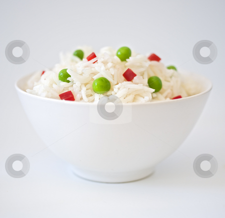 To use this stock image in your creative project, please select the size you need over to the right and click the "Add to Cart" button.
Your downloaded image will come with the Cutcaster watermark removed so don’t worry about the watermark you see on this page. Bowl of rice with peas an peppres stock photo, Bowl of rice with peas an peppres on white by Noam Armonn