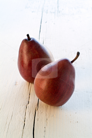 To use this stock image in your creative project, please select the size you need over to the right and click the "Add to Cart" button.
Your downloaded image will come with the Cutcaster watermark removed so don’t worry about the watermark you see on this page. Two Red Pears stock photo, Two Red Pears on white wooden surface by Noam Armonn