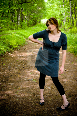 To use this stock image in your creative project, please select the size you need over to the right and click the "Add to Cart" button.
Your downloaded image will come with the Cutcaster watermark removed so don’t worry about the watermark you see on this page. Path Through the Woods stock photo, A young woman posing on a wooded path. by Todd Arena