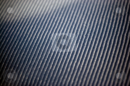 To use this stock image in your creative project, please select the size you need over to the right and click the "Add to Cart" button.
Your downloaded image will come with the Cutcaster watermark removed so don’t worry about the watermark you see on this page. Real Carbon Fiber stock photo, A closeup of real carbon fiber material. This makes an excellent texture or background. Shallow depth of field. by Todd Arena